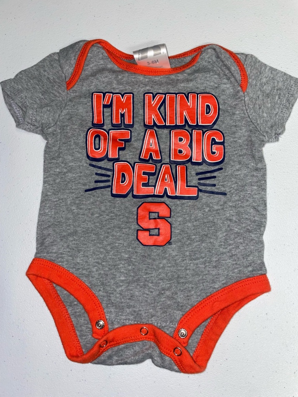 Russell: I’m Kind of a Big Deal Gray/Orange Baby Onesie (3-6 Months)